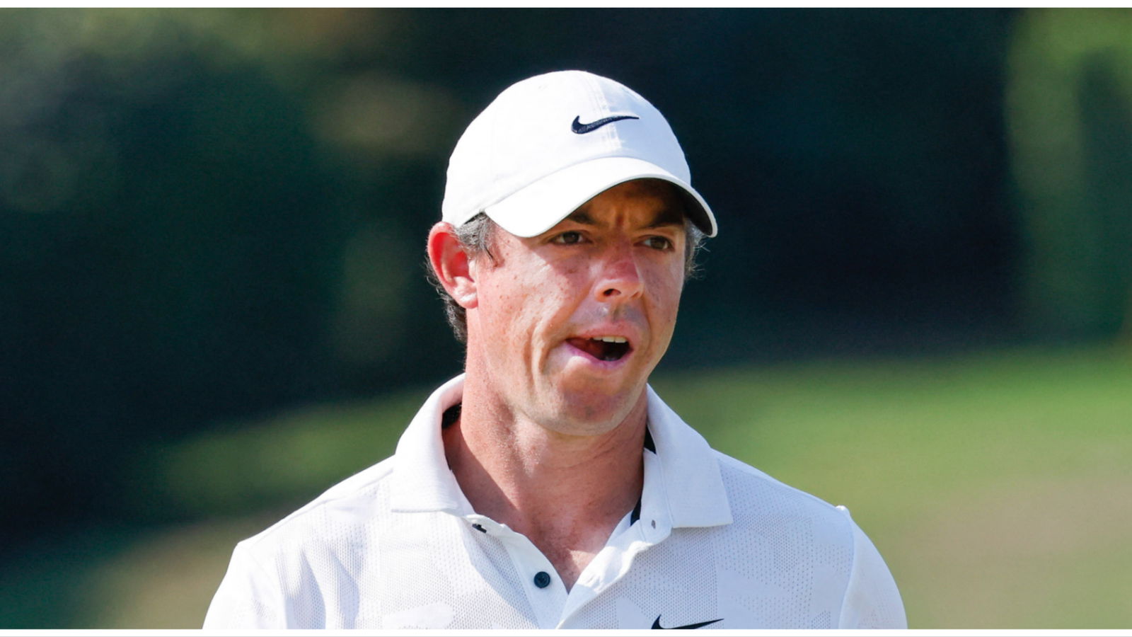 Watch Rory McIlroy slap the bum of PGA rival after being pipped to $3.6m payday